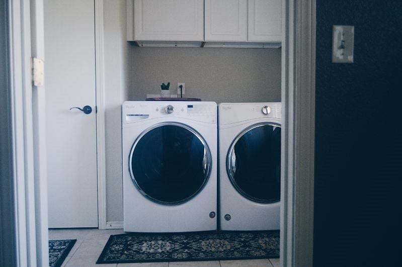 Laundry room with brand new washer and dryer