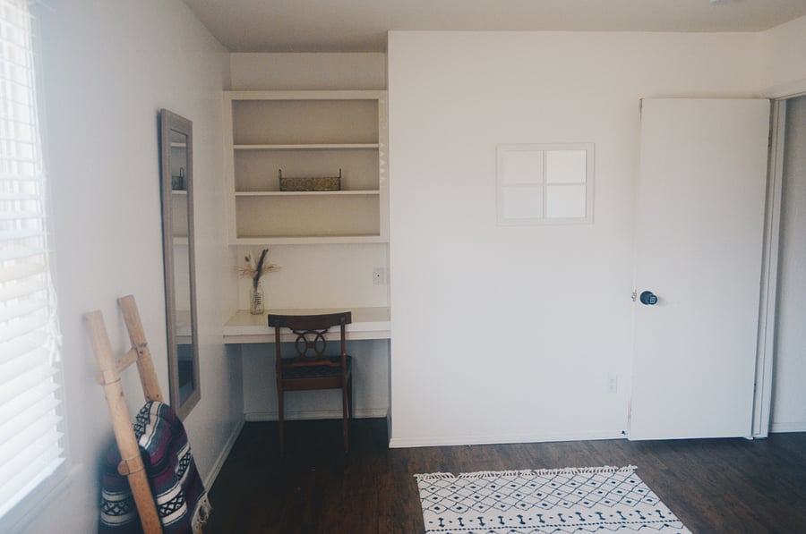 4. South bedroom with full-sized bed and built-in desk
