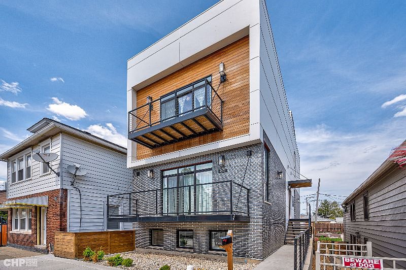 Stay in the lower level suite in this modern unique new construction home. Dedicated entrance for lower level suite is located in the rear. Grade level drops down in rear.