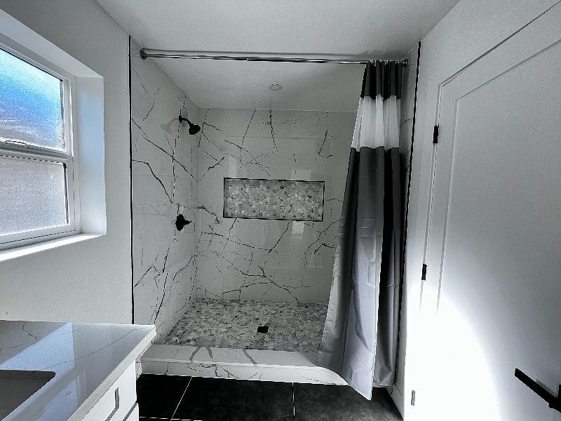 View of the enormous tile shower