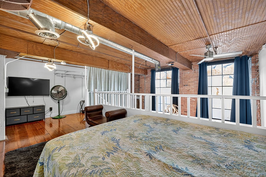 Bedroom with 55" Smart TV and Walk In Closet