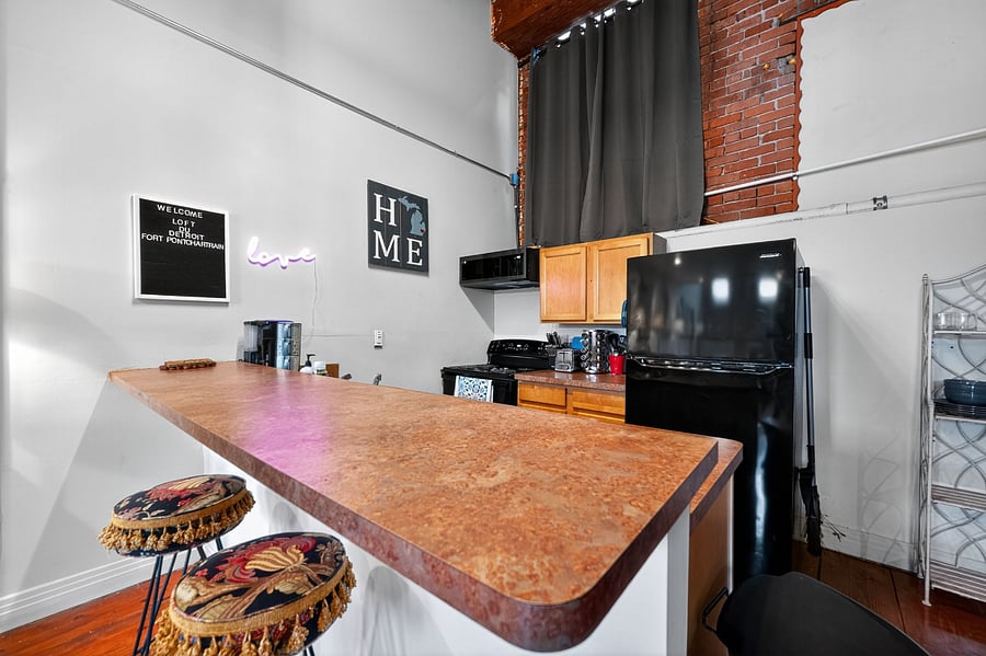 Kitchen with Dishwasher, Stove and Oven, Full size Refrigerator, and Microwave