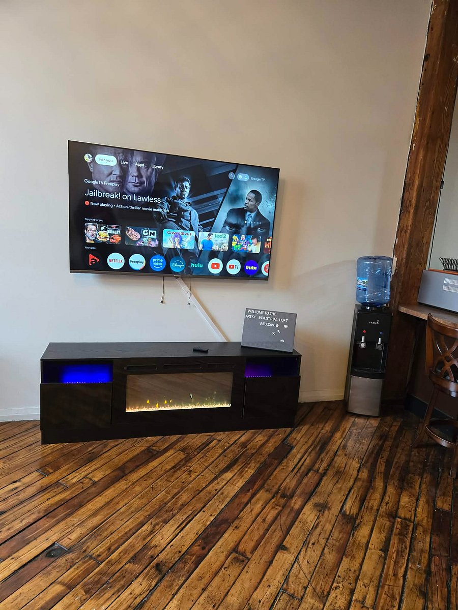 Fireplace and 65" Smart TV
