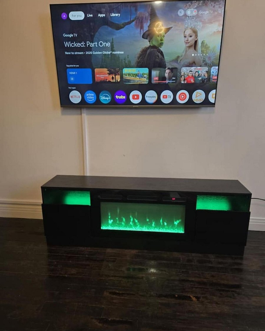 Fireplace and 65" Smart TV