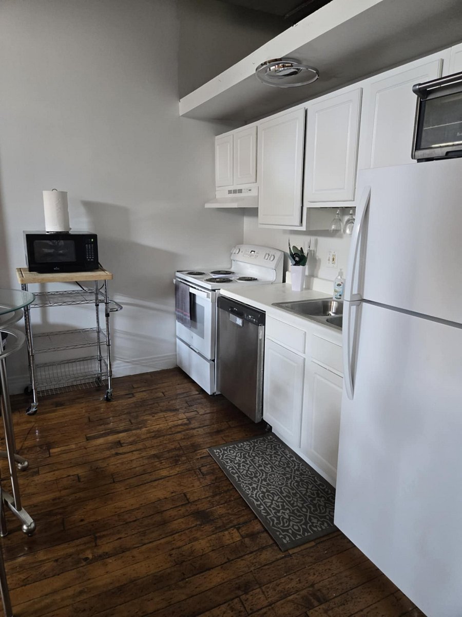 Kitchen with Full Dishwasher