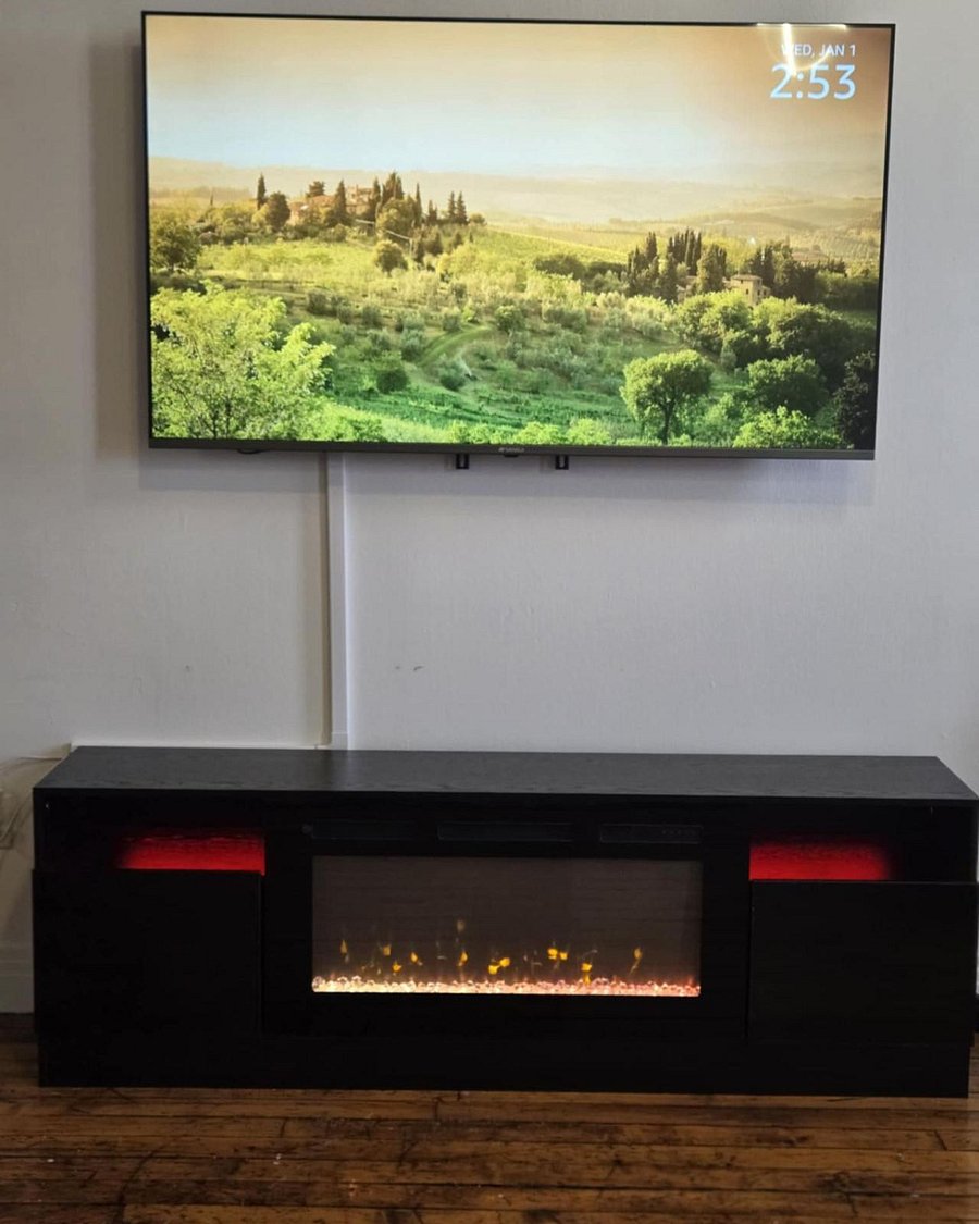 Fireplace and 65" Smart TV