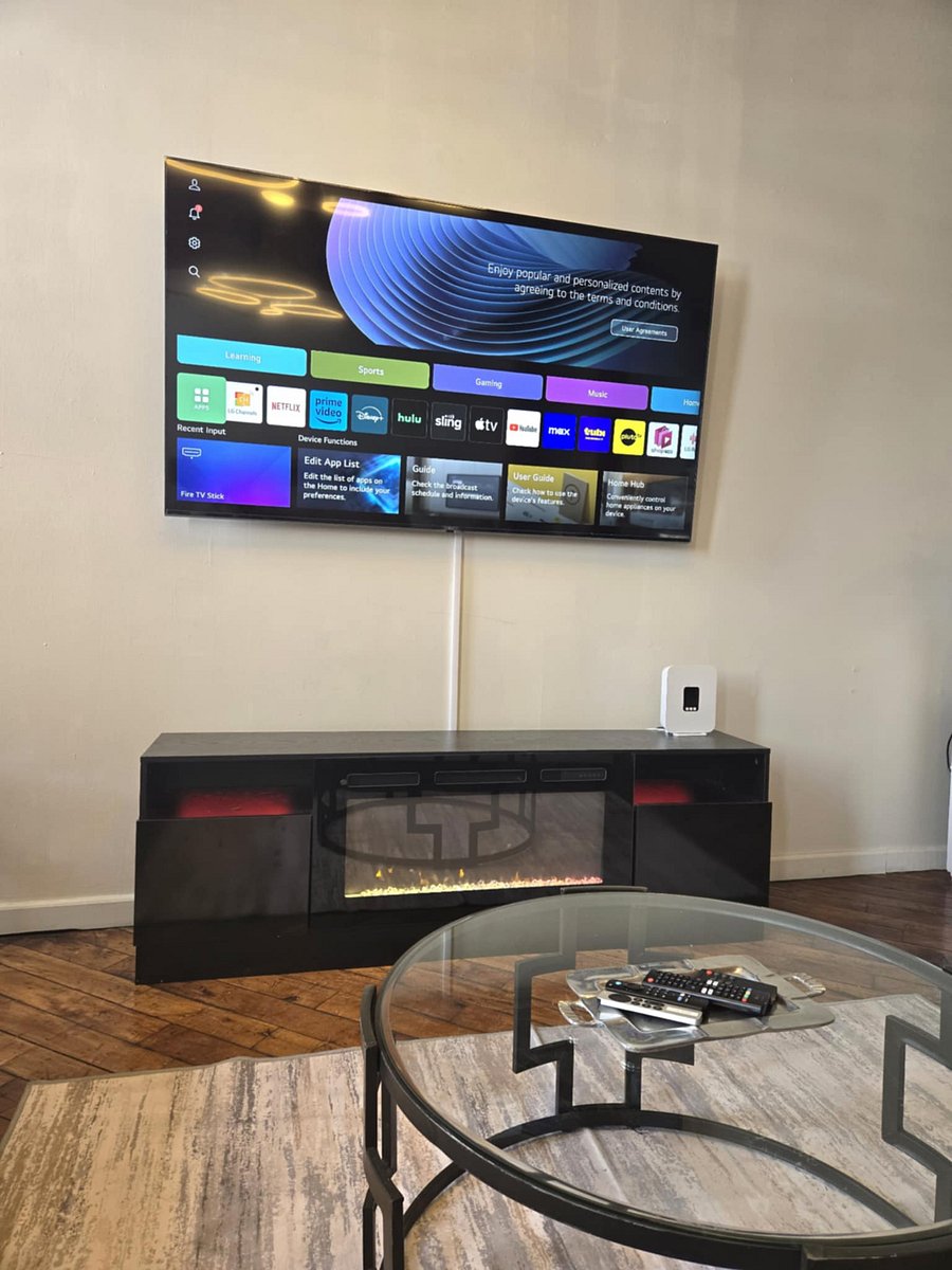 75" Streaming TV and Fireplace