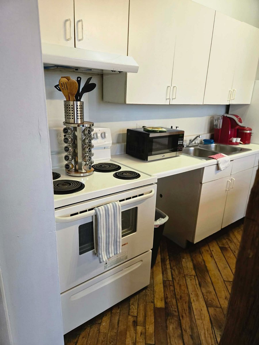 Kitchen with Stove and Oven, Microwave, and Kurig Coffee Station