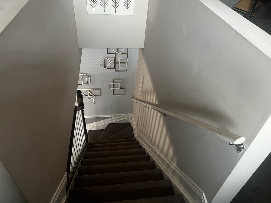 Stairs leading Premier bedroom 
