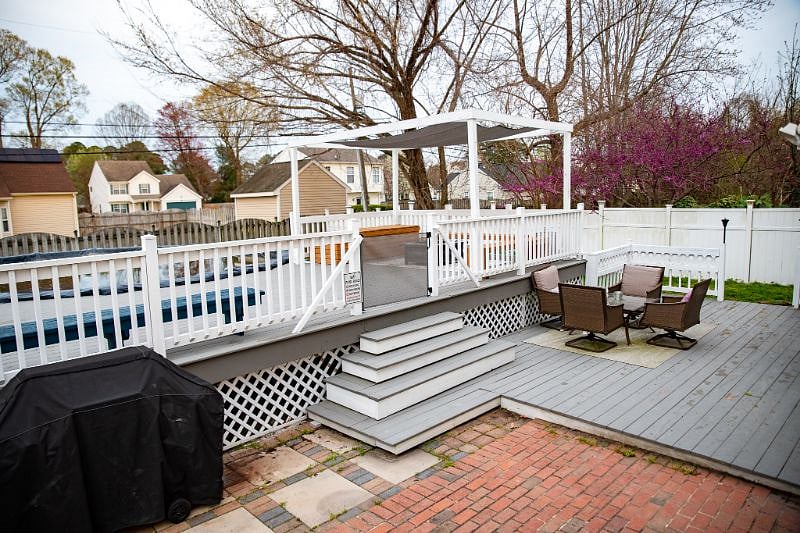 Outdoor oasis, patio chairs on upper deck as well