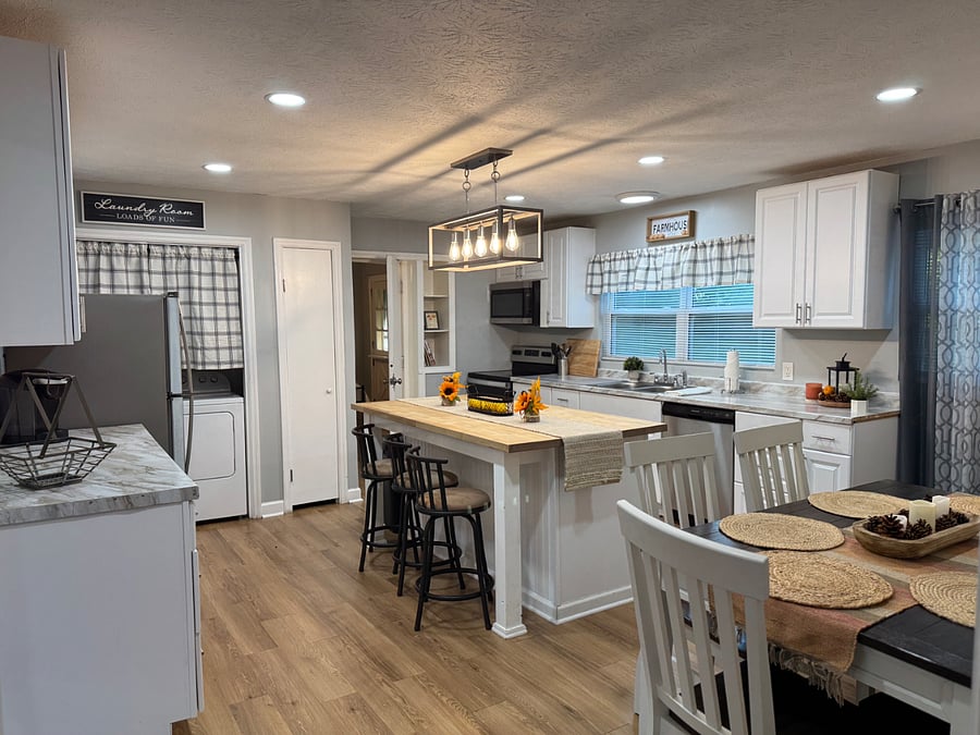 Fully Equipped Kitchen with Coffee Bar & Modern Appliances. Stocked essentials * Full-Size Fridge * Island seating