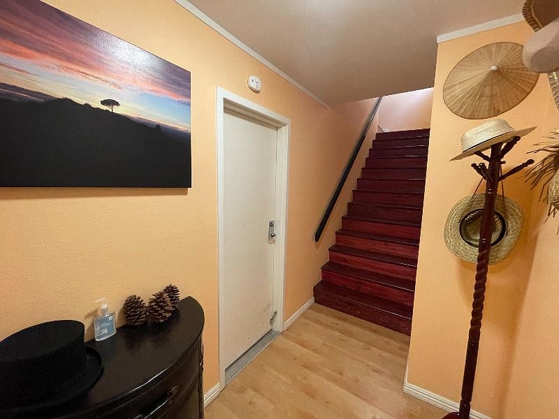 Stairs are necessary to take from front door or garage entrance to living areas upstairs
