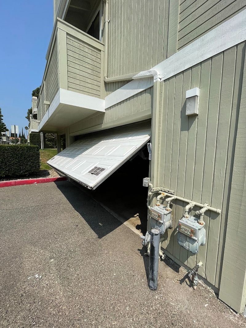 Garage door opens out, be careful when opening using the keypad