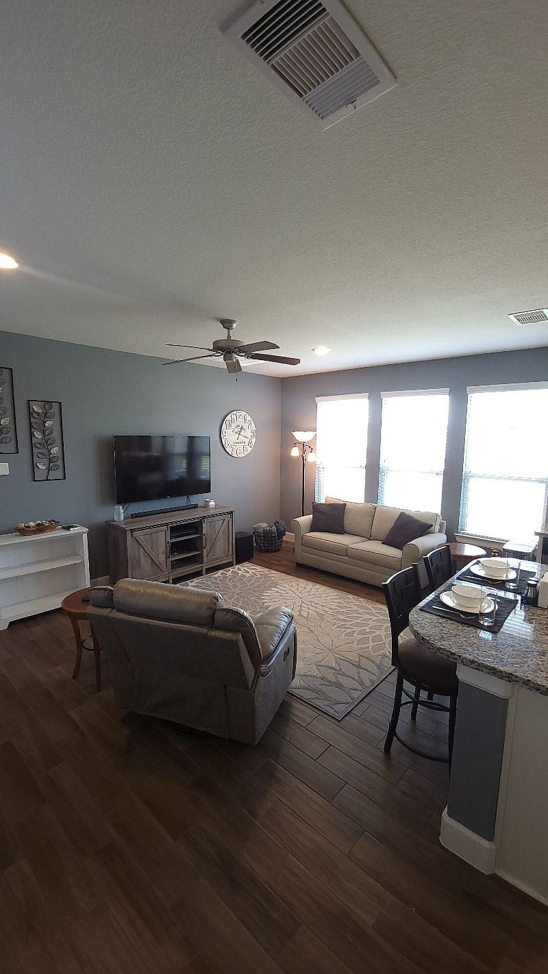 Entrance to open concept living room and kitchen