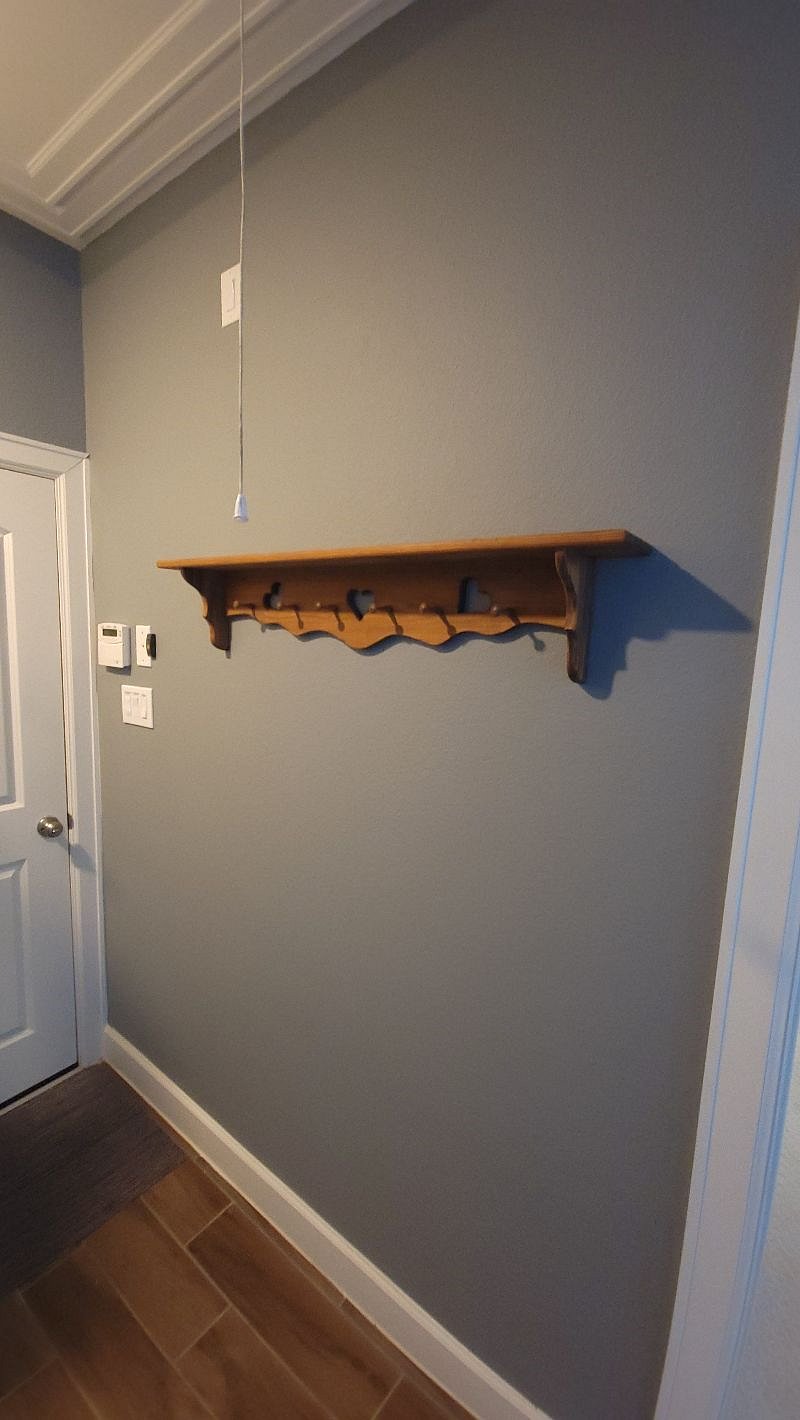 Hallway rack across from laundry center