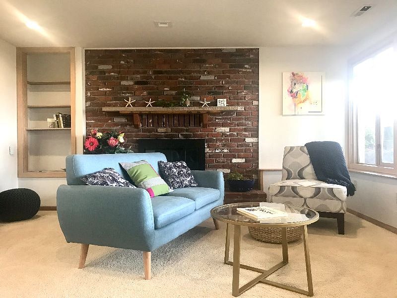 Step down living room with views of Puget Sound.