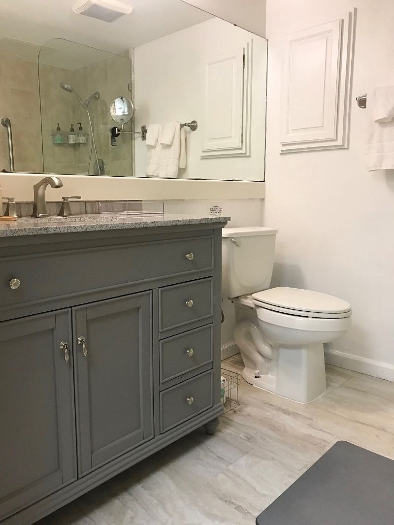 Full bathroom with shower. House has a total of 1.5 bathrooms.
