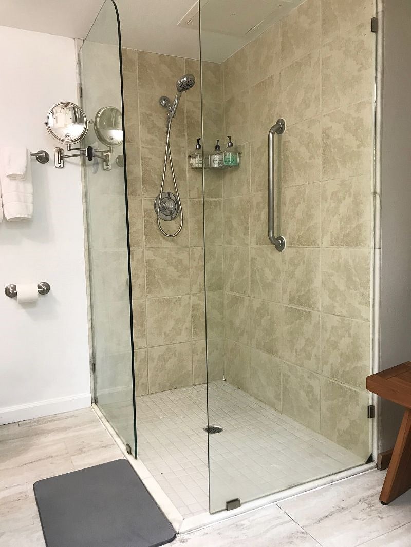 Full bathroom with shower. House has a total of 1.5 bathrooms.