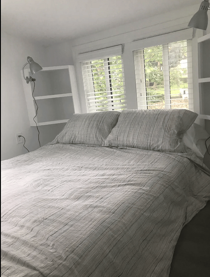 Queen sized bed in loft.