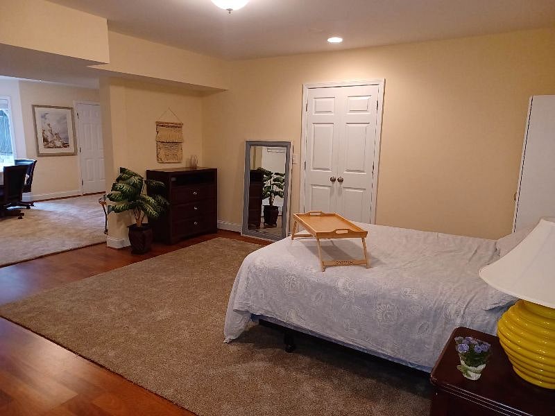 Queen bed, dresser, full size mirror, storage closet.