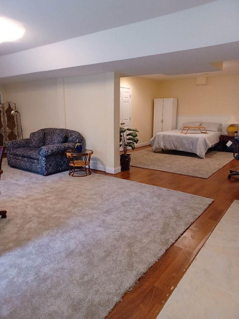 Open concept bedroom and bonus reading room.