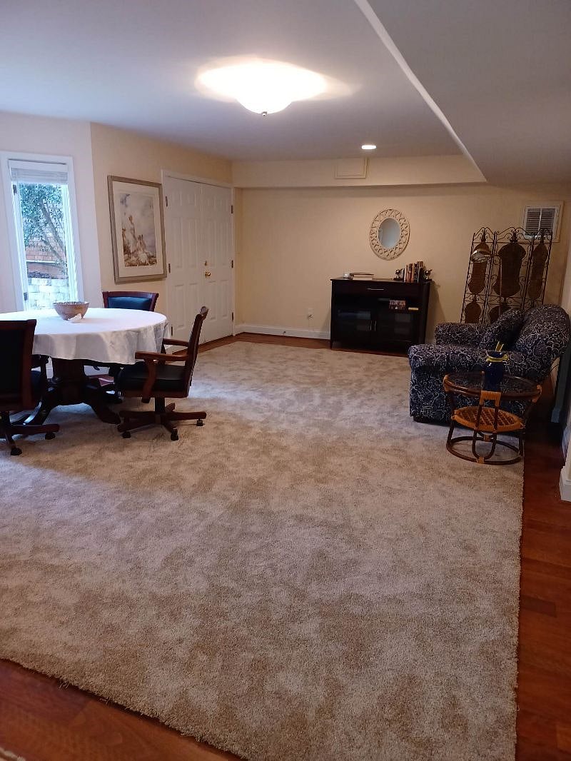 Spacious game table in reading room with books, puzzles and games available.
