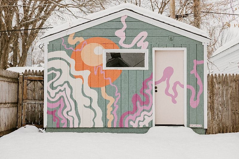 Local muralist painted this on the garage so you can view it from kitchen and back
patio