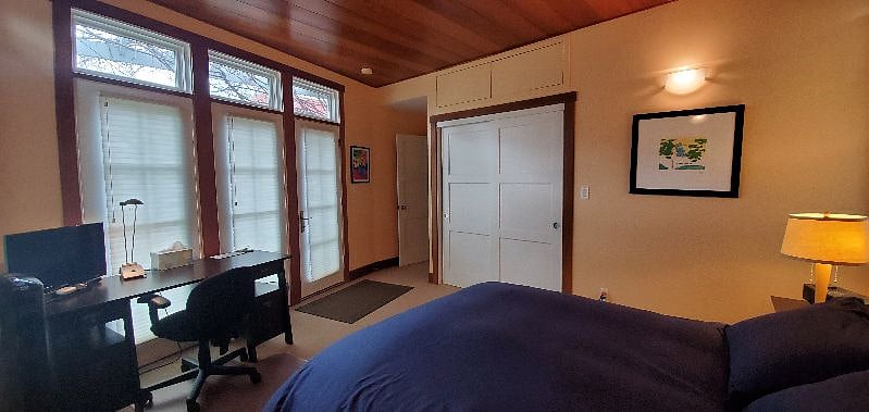 There is a small fridge and microwave inside the closet.