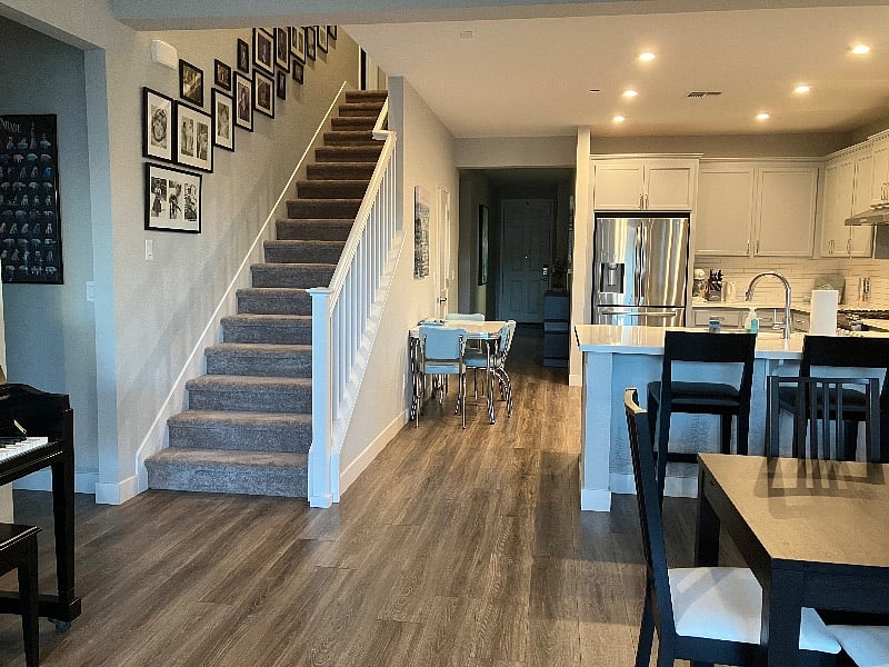 Entry, and stairway to upstairs suite.