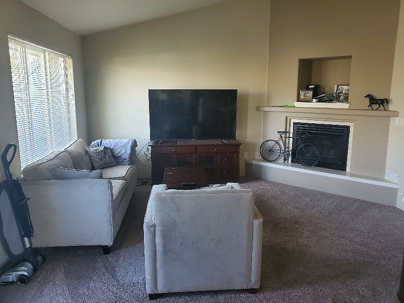 Shared living room with fireplace