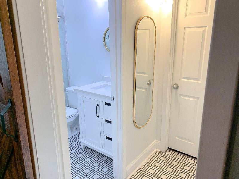 Stylish tile within bathroom area.