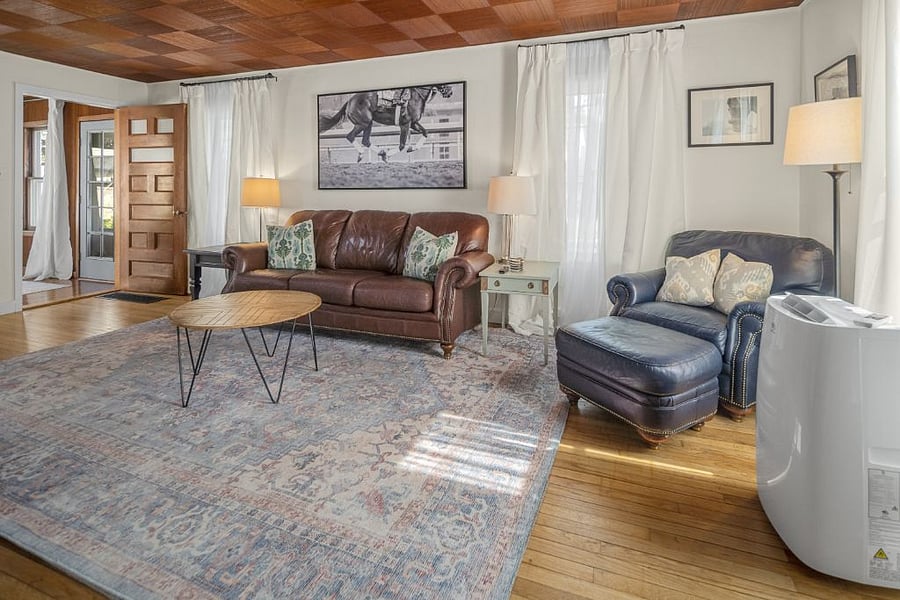 70 Smart TV | Books | Board Games | Leather Couch | Leather Chair & Ottoman
