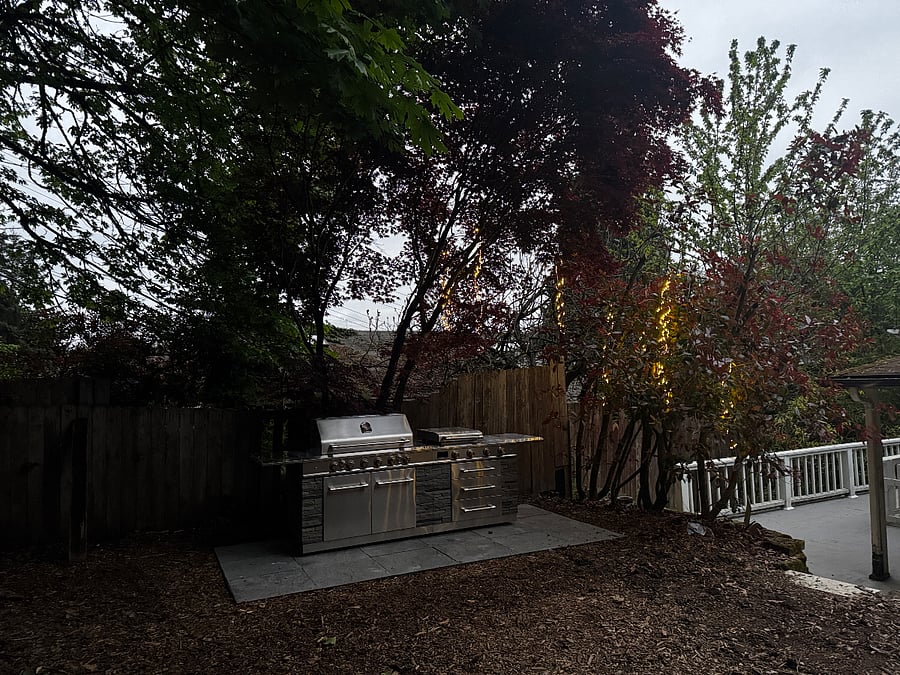 Propane grill, gas burners, griddle with counter space. Pull out trash can and drawers with all the utensils.