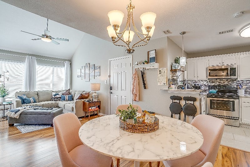 Full dining room open to kitchen and living space.
