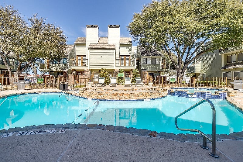Lounge chairs and easy entry pool area for all ages.
