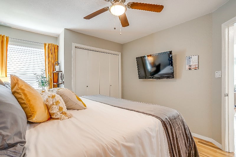 Main level king bedroom with Amazon firestick for your streaming enjoyment.