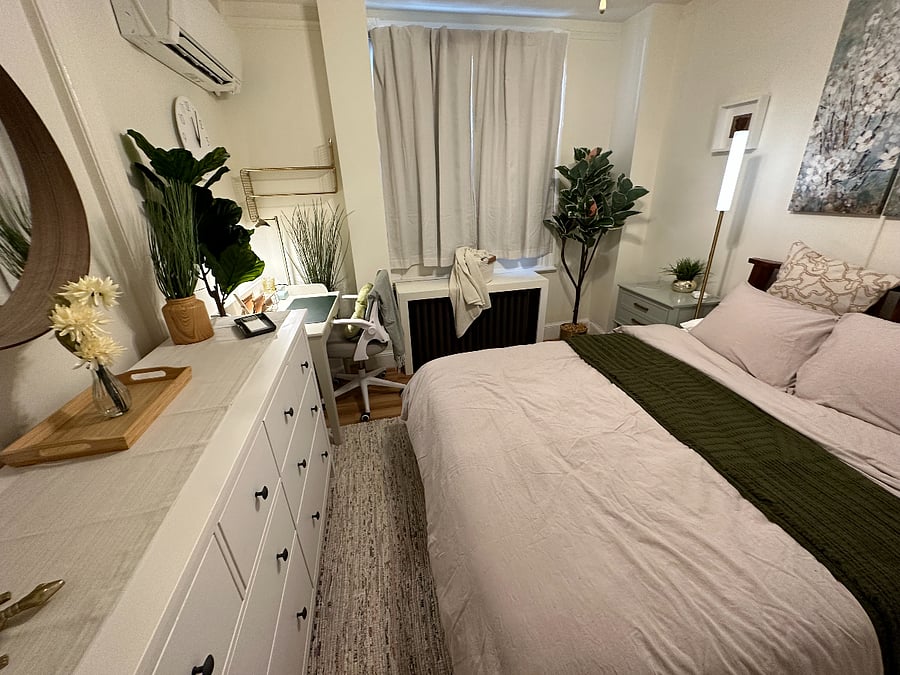 The room offers a spacious full-sized closet and dresser with plenty of drawers, providing ample storage for all your belongings, so you can feel right at home.