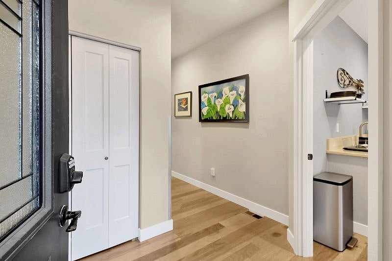 Entry way with coat closet, hangers, and extra storage for your extended stay.