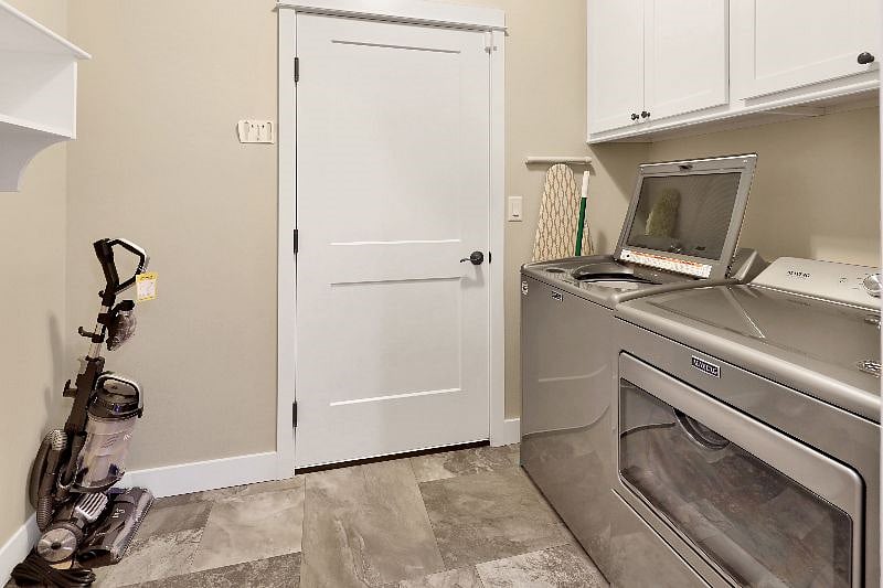 Brand new full size Maytag washer and dryer. Iron, ironing board, vacuum, and extra storage are available in mudroom. 