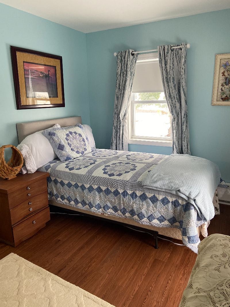 Sleep soundly in this cozy Bed with room darkening shades and curtains 