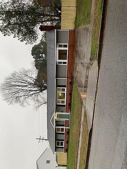 Ranch Style One Story Single Family Home - Parking Driveway on Lot