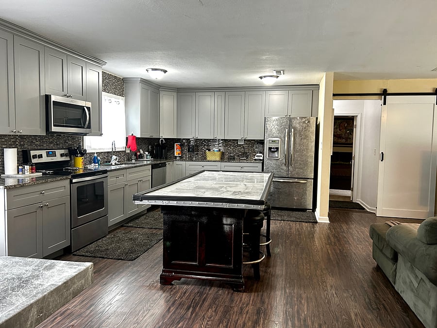 Open Floor plan. with privacy Barn door to Bedroom #1 and Full size Laundry Room HE Top loader Washer and HE Dryer Front Loader. We also have Deep Freezer located in the laundry room .