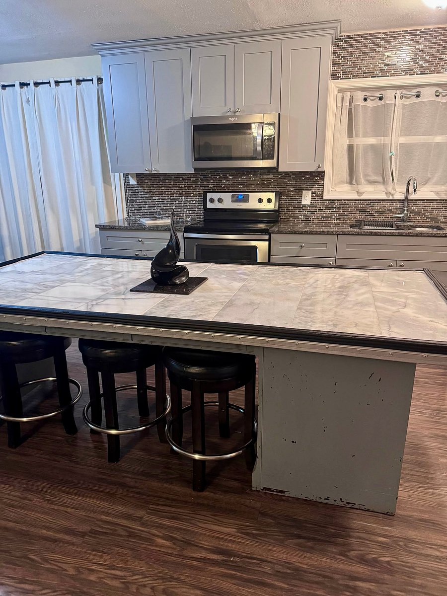 Marble kitchen island and second dining table