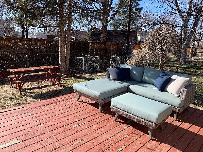 Comfy outdoor lounging area on back deck