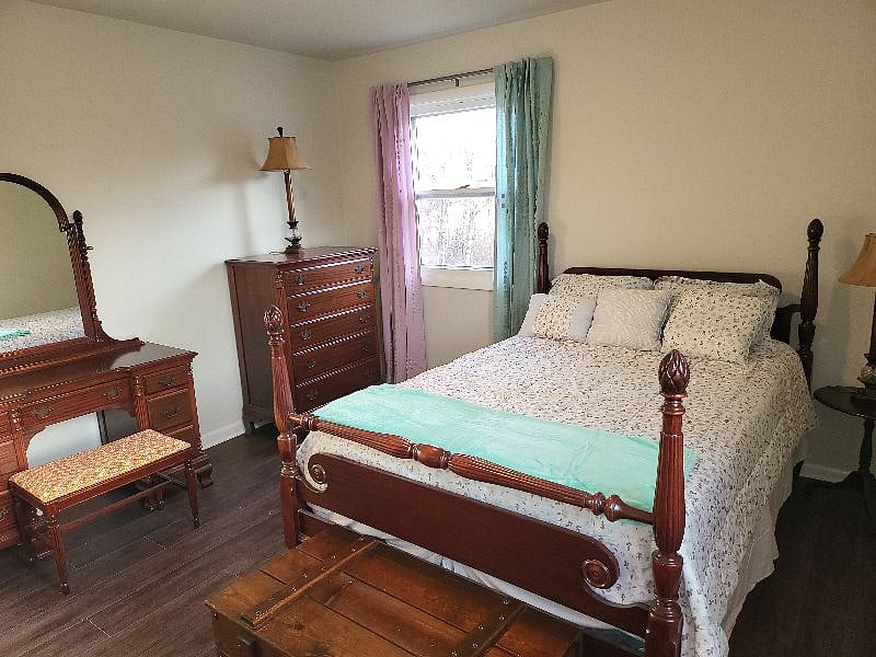 Secondary bedroom with some old warm charm.