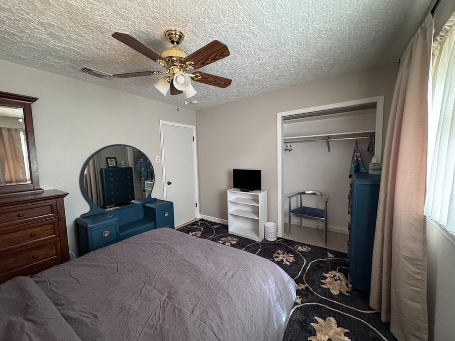 Third bedroom with full size bed and T.V.