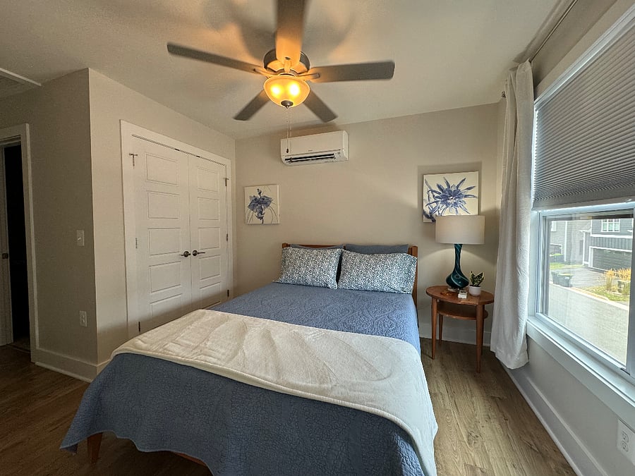 Queen size bed with memory foam mattress.