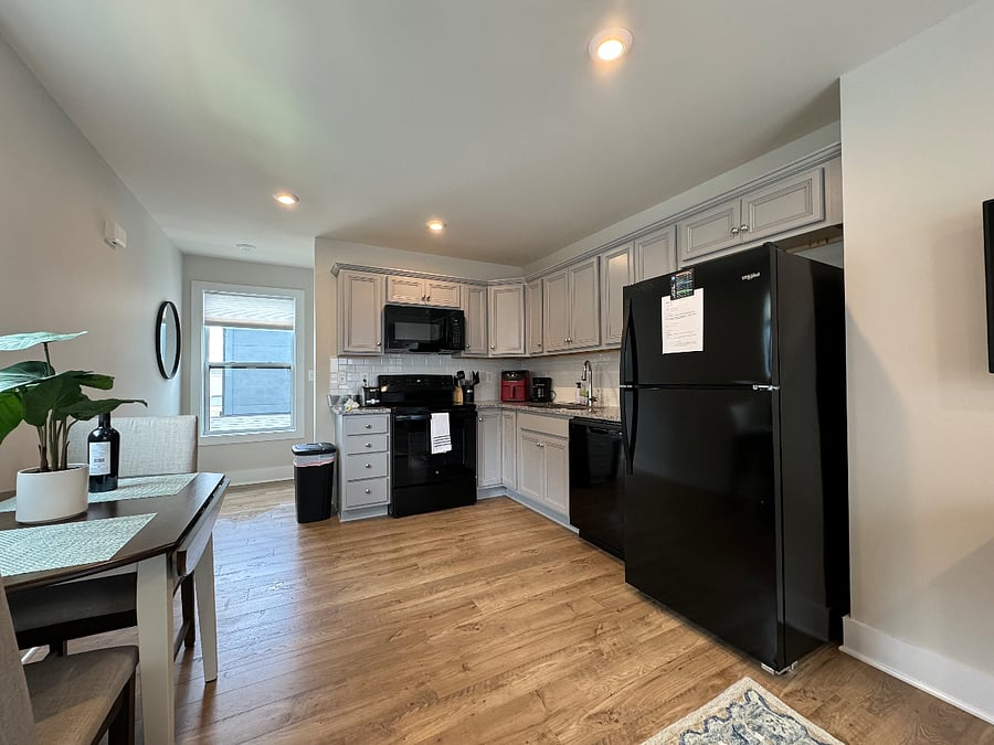 Full kitchen including things like coffee maker and air fryer.