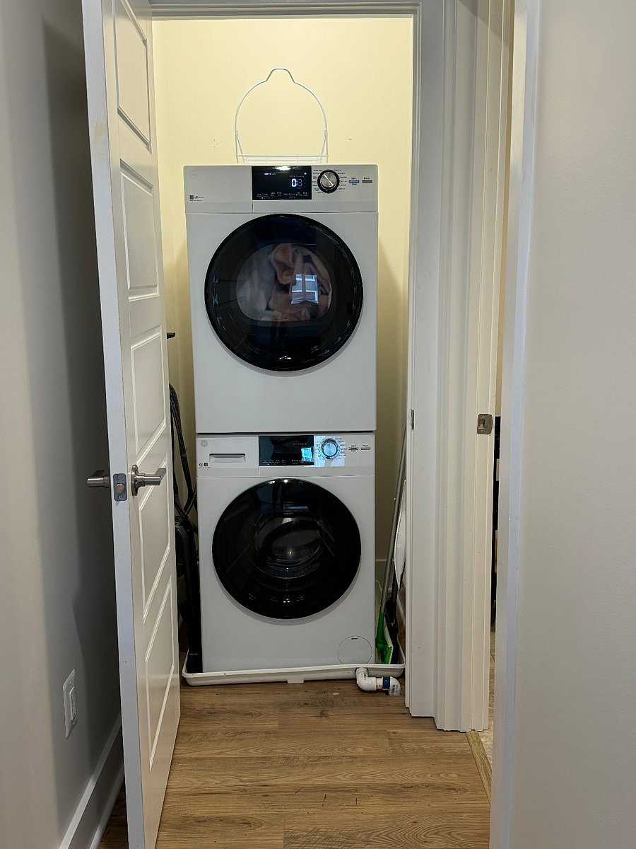 Washer and dryer are inside the apartment.  An iron and ironing board are included.