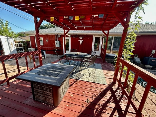 Shared outdoor pergola and gas firepit.